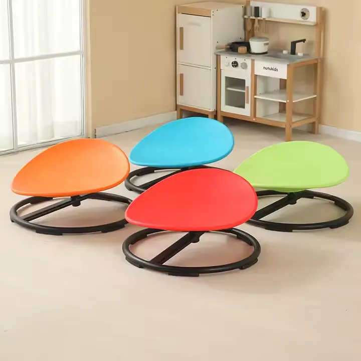 Orange, blue, red and green children’s spinning chairs, each with a curved seat and circular base